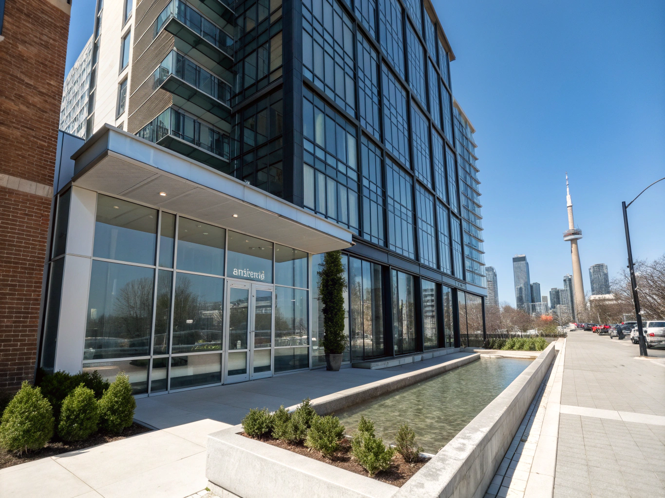 Modern urban corner condominium with private balcony in Queen West